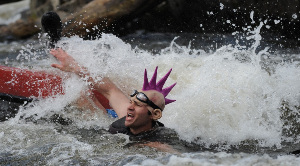 A canoeist takes a spill at Six Mile Falls on Saturday during the Kenduskeag Stream Canoe Race. A canoeist takes a spill at Six Mile Falls on Saturday during the Kenduskeag Stream Canoe Race.
