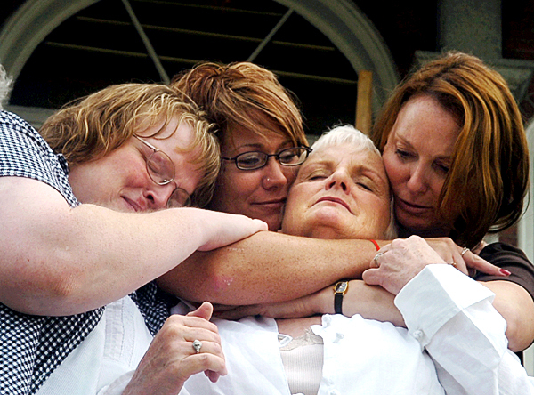 Lucille Hoxie (third from left) is hugged by daughter Lucinda Hoxie (left), Jennifer Nickerson-Steward and Candy Daniels outside the Somerset County Courthouse on Wednesday after a guilty verdict in Shannon Atwood's trial for the murder of Lucille Hoxie's daughter Cheryl Murdoch. Nickerson-Steward was assault by Atwood in 1993, and Daniels' sister Shirley Moon-Atwood was married to Atwood and remains missing since 2006. (BANGOR DAILY NEWS PHOTO BY KATE COLLINS)
CAPTION
Lucille Hoxie, third from left, is hugged by daughter Lucinda Hoxie, left, Jennifer Nickerson-Steward, and Candy Daniels, outside the Somerset County Courthouse on Wednesday, July 2, 2008, following a guilty verdict in Shannon Atwood's trial for the murder of Hoxie's daughter, Cheryl Murdoch. Nickerson-Steward was assaulter by Atwood in 1993, and Daniel's sister, Shirely Moon-Atwood, was married to Atwood and remains missing since 2006. (Bangor Daily News/Kate Collins) Lucille Hoxie (third from left) is hugged by daughter Lucinda Hoxie (left), Jennifer Nickerson-Steward and Candy Daniels outside the Somerset County Courthouse on Wednesday after a guilty verdict in Shannon Atwood's trial for the murder of Lucille Hoxie's daughter Cheryl Murdoch. Nickerson-Steward was assault by Atwood in 1993, and Daniels' sister Shirley Moon-Atwood was married to Atwood and remains missing since 2006. (BANGOR DAILY NEWS PHOTO BY KATE COLLINS)
CAPTION
Lucille Hoxie, third from left, is hugged by daughter Lucinda Hoxie, left, Jennifer Nickerson-Steward, and Candy Daniels, outside the Somerset County Courthouse on Wednesday, July 2, 2008, following a guilty verdict in Shannon Atwood's trial for the murder of Hoxie's daughter, Cheryl Murdoch. Nickerson-Steward was assaulter by Atwood in 1993, and Daniel's sister, Shirely Moon-Atwood, was married to Atwood and remains missing since 2006. (Bangor Daily News/Kate Collins)
