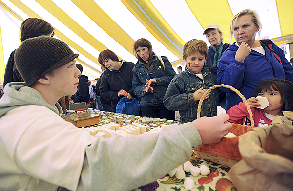 Ansel Critchfield, left, of Casco offers his home soap to people attending the Common Ground Fair on Friday, September 25, 2009. Critchfield and his sister, Maya, known as the soap guy and the soap girl are part of the Youth Enterprise Zone, where talented young entrepreneurs test their products and sales skills. (Bangor Daily News/Kevin Bennett) Ansel Critchfield, left, of Casco offers his home soap to people attending the Common Ground Fair on Friday, September 25, 2009. Critchfield and his sister, Maya, known as the soap guy and the soap girl are part of the Youth Enterprise Zone, where talented young entrepreneurs test their products and sales skills. (Bangor Daily News/Kevin Bennett)