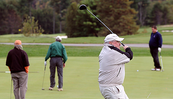 Jack May of Belfast tees off on the 10th hole during a golf tornament at the Penobscot Valley Country Club in Orono Friday. The tournament and silent auction was held in memory of John P. Bishop of Castine, who passed away last year, and it helped raise awareness of Duchenne muscular dystrophy. The proceeds from the auction benefit the Parent Project Muscular Dystrophy. (Bangor Daily News/Gabor Degre) Jack May of Belfast tees off on the 10th hole during a golf tornament at the Penobscot Valley Country Club in Orono Friday. The tournament and silent auction was held in memory of John P. Bishop of Castine, who passed away last year, and it helped raise awareness of Duchenne muscular dystrophy. The proceeds from the auction benefit the Parent Project Muscular Dystrophy. (Bangor Daily News/Gabor Degre)
