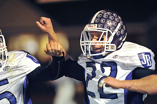 JOhn Bapst's Bill Wetherbee, (22), celebrates after scoring on a two point conversion on the second touchdown of the first quarter on their game with Foxcroft Academy , Friday, Oct. 23, 2009. Bangor Daily News/Michael C. York JOhn Bapst's Bill Wetherbee, (22), celebrates after scoring on a two point conversion on the second touchdown of the first quarter on their game with Foxcroft Academy , Friday, Oct. 23, 2009. Bangor Daily News/Michael C. York