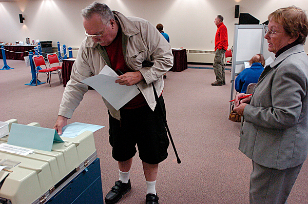 (BANGOR DAILY NEWS PHOTO BY JOHN CLARKE RUSS)
CAPTION
William Vandegrift of Bangor casts his early vote as ward clerk Mary Ellen Sullivan,right, advises just just after the polls opened Monday morning at the Bangor Civic Center. " There are no crowds and it's convenient, " said Vandegrift of his decision to vote early. The Bangor Civic Center was one of several sites across the state participating in Maine's Early Voting Pilot Program. (Bangor Daily News/John Clarke Russ) (BANGOR DAILY NEWS PHOTO BY JOHN CLARKE RUSS)
CAPTION
William Vandegrift of Bangor casts his early vote as ward clerk Mary Ellen Sullivan,right, advises just just after the polls opened Monday morning at the Bangor Civic Center. " There are no crowds and it's convenient, " said Vandegrift of his decision to vote early. The Bangor Civic Center was one of several sites across the state participating in Maine's Early Voting Pilot Program. (Bangor Daily News/John Clarke Russ)