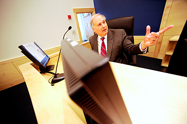 CAPTION
Justice Warren Silver sits in his chair behind the bench in the Maine Supreme Court's ceremonial courtroom--one of seven courtrooms in the soon-to-open Penobscot Judicial Center in downtown Bangor. Photographed while Justice Silver and Justice Andrew Meade gave the Bangor Daily News a tour of the new facility Friday morning, November 6, 2009. BANGOR DAILY NEWS PHOTO BY JOHN CLARKE RUSS CAPTION
Justice Warren Silver sits in his chair behind the bench in the Maine Supreme Court's ceremonial courtroom--one of seven courtrooms in the soon-to-open Penobscot Judicial Center in downtown Bangor. Photographed while Justice Silver and Justice Andrew Meade gave the Bangor Daily News a tour of the new facility Friday morning, November 6, 2009. BANGOR DAILY NEWS PHOTO BY JOHN CLARKE RUSS