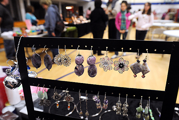 People walk around at the Craft Fair at the Bangor Christian High School Saturday. The fair strted this year will benefit the Boosters Club and featured 20 vendors. In the foreground are ear rings made by Carmen Mosher of Smithfield. (bangor daily News/Gabor Degre) People walk around at the Craft Fair at the Bangor Christian High School Saturday. The fair strted this year will benefit the Boosters Club and featured 20 vendors. In the foreground are ear rings made by Carmen Mosher of Smithfield. (bangor daily News/Gabor Degre)