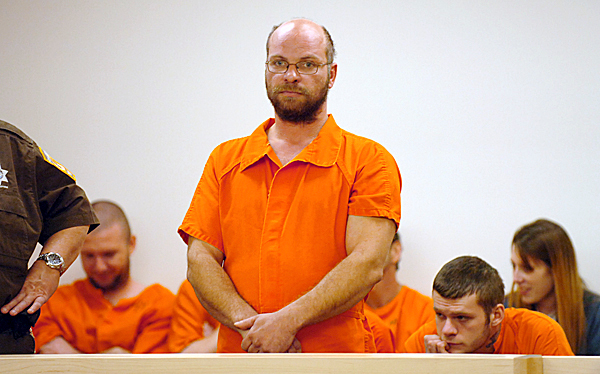 Douglas Deloge, 39, of Medway made his first appearance before Judge Jessie Gunther on Monday, Nov. 23, 2009 at the Penobscot Judicial Center on the first day the center was open for business. Deloge is charged with setting fire last week to an abandoned house. Douglas Deloge, 39, of Medway made his first appearance before Judge Jessie Gunther on Monday, Nov. 23, 2009 at the Penobscot Judicial Center on the first day the center was open for business. Deloge is charged with setting fire last week to an abandoned house.