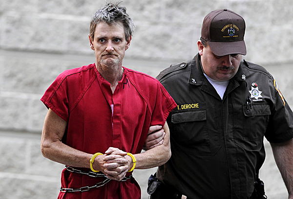Perley Goodrich Jr. is escorted from jail to Penobscot Superior Court Friday afternoon, October 30,2009. Goodrich was arrested in the Newport Big Stop after being spotted there early Friday morning. State and local police spent most of this week on a manhunt for Goodrich who is wanted for questioning following the Monday night murder of his father and severe beating of his mother at their home in Newport. Perley Goodrich Jr. is escorted from jail to Penobscot Superior Court Friday afternoon, October 30,2009. Goodrich was arrested in the Newport Big Stop after being spotted there early Friday morning. State and local police spent most of this week on a manhunt for Goodrich who is wanted for questioning following the Monday night murder of his father and severe beating of his mother at their home in Newport.