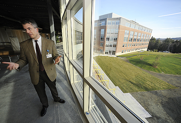 Brad Coffey, Champion the Cure director, shows off the third floor of the new Lafayette Family Cancer Center on Whiting Hill in Brewer. In the background (outside) is EMHS's Cianchette Building. (Bangor Daily News/John Clarke Russ) Brad Coffey, Champion the Cure director, shows off the third floor of the new Lafayette Family Cancer Center on Whiting Hill in Brewer. In the background (outside) is EMHS's Cianchette Building. (Bangor Daily News/John Clarke Russ)