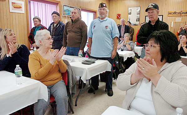 Penobscot Nation veterans are honored for their service by community members and the U.S. Army at a ceremony at the Penobscot Community Center on Indian Island on Thursday, Dec. 10, 2009, during which United States Army Freedom Team Salute commendations were presented to a few of the Army veterans. Penobscot Nation Chief Kirk Francis was also honored with a U.S. Army Freedom Team Salute Supporter commendation, the first time such a recognition has been given to a Native American Head of Nation. Penobscot Nation veterans are honored for their service by community members and the U.S. Army at a ceremony at the Penobscot Community Center on Indian Island on Thursday, Dec. 10, 2009, during which United States Army Freedom Team Salute commendations were presented to a few of the Army veterans. Penobscot Nation Chief Kirk Francis was also honored with a U.S. Army Freedom Team Salute Supporter commendation, the first time such a recognition has been given to a Native American Head of Nation.
