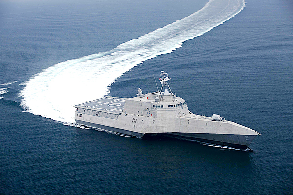 This image provided by the US Navy shows the littoral combat ship Independence (LCS 2) underway during builder's trials on July 12, 2009. Builder's trials are the first opportunity for the shipbuilder and the U.S. Navy to operate the ship underway, and provide an opportunity to test and correct issues before acceptance trials. The second of the Navy's new generation of speedy warships designed to operate close to shore topped 50 miles per hour in builder trials completed this month. Officials say the Independence, a 418-foot ship built in Alabama, traveled in excess of 45 knots, which equates to nearly 52 mph, and sustained 44 knots during a four-hour, full-speed sprint. (AP Photo/Dennis Griggs - US Navy) This image provided by the US Navy shows the littoral combat ship Independence (LCS 2) underway during builder's trials on July 12, 2009. Builder's trials are the first opportunity for the shipbuilder and the U.S. Navy to operate the ship underway, and provide an opportunity to test and correct issues before acceptance trials. The second of the Navy's new generation of speedy warships designed to operate close to shore topped 50 miles per hour in builder trials completed this month. Officials say the Independence, a 418-foot ship built in Alabama, traveled in excess of 45 knots, which equates to nearly 52 mph, and sustained 44 knots during a four-hour, full-speed sprint. (AP Photo/Dennis Griggs - US Navy)