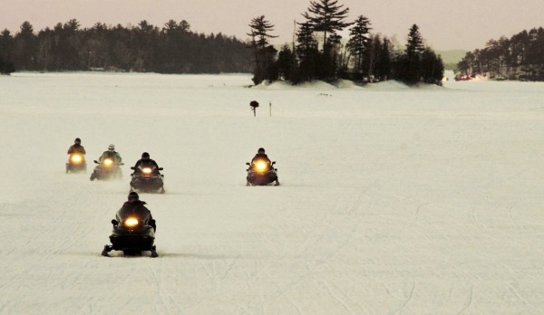 Snowmobilers head across Moosehead Lake near Greenville at dusk last week. The state has recorded 14 snowmobile deaths this winter, and the season is not over. Some areas have enough snow to accommodate a couple more weeks of sledding. AP PHOTO BY PAT WELLENBACH Snowmobilers head across Moosehead Lake near Greenville at dusk last week. The state has recorded 14 snowmobile deaths this winter, and the season is not over. Some areas have enough snow to accommodate a couple more weeks of sledding. AP PHOTO BY PAT WELLENBACH