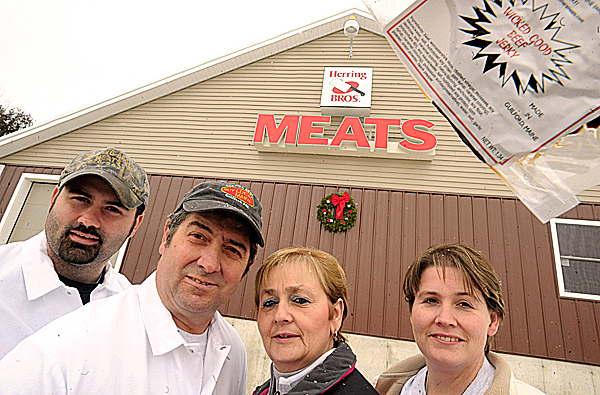 An addition to the products at the Herring Bros. Meats is the Wicked Good Beef Jerky, which has been a success. The owners of the Herring Bros. in Guilford are, from left, Trey Gilbert, Tom Gilbert, Andrea Gilbert and Ellie Patterson. BANGOR DAILY NEWS PHOTO BY GABOR DEGRE An addition to the products at the Herring Bros. Meats is the Wicked Good Beef Jerky, which has been a success. The owners of the Herring Bros. in Guilford are, from left, Trey Gilbert, Tom Gilbert, Andrea Gilbert and Ellie Patterson. BANGOR DAILY NEWS PHOTO BY GABOR DEGRE