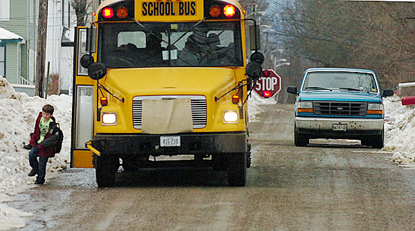 A Woodland Elementary School student gets off the bus on Summit Street in Woodland on Tuesday, Jan. 5, 2009. Parents voiced their concern at a school board meeting Tuesday night regarding an incident last month when a 5-year-old child was dropped at the wrong location after school, at his home rather than his daycare, leaving him outside in the cold for three hours. Some parents say this was not an isolated incident of a child being dropped at the wrong place but that it has happened many times. BANGOR DAILY NEWS PHOTO BY BRIDGET BROWN A Woodland Elementary School student gets off the bus on Summit Street in Woodland on Tuesday, Jan. 5, 2009. Parents voiced their concern at a school board meeting Tuesday night regarding an incident last month when a 5-year-old child was dropped at the wrong location after school, at his home rather than his daycare, leaving him outside in the cold for three hours. Some parents say this was not an isolated incident of a child being dropped at the wrong place but that it has happened many times. BANGOR DAILY NEWS PHOTO BY BRIDGET BROWN