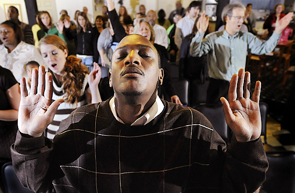 William Dairyko of Bangor and other congregants lift up their hands to the Lord during Destiny Worship Center's Sunday service held in Next Generation Theatre in Brewer November 22,2009. Since starting the congregation in March 2009, Pastor Brian Hurst has seen the congregation steadily grow. BANGOR DAILY NEWS PHOTO BY JOHN CLARKE RUSS William Dairyko of Bangor and other congregants lift up their hands to the Lord during Destiny Worship Center's Sunday service held in Next Generation Theatre in Brewer November 22,2009. Since starting the congregation in March 2009, Pastor Brian Hurst has seen the congregation steadily grow. BANGOR DAILY NEWS PHOTO BY JOHN CLARKE RUSS