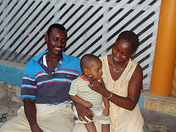 Isaac with his birth parents in Haiti. MEG HASKELL STORY Isaac with his birth parents in Haiti. MEG HASKELL STORY