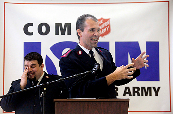 Capt. Josh Lyle, left, of the Salvation Army of Bangor reacts to a funny anecdote told by Capt. Brett DeMichael (foreground) of the Salvation Army Northern New England division office in Portland during the annual Volunteer Brunch at the Salvation Army of Bangor Wednesday, February 3, 2010. The Bangor Salvation Army handed out volunteer awards and recapped their achievements over the past year. They hope to raise $20,000 to send 125 youths to Camp Sebago this summer where Capt. DeMichael is camp director. (Bangor Daily News/John Clarke Russ) Capt. Josh Lyle, left, of the Salvation Army of Bangor reacts to a funny anecdote told by Capt. Brett DeMichael (foreground) of the Salvation Army Northern New England division office in Portland during the annual Volunteer Brunch at the Salvation Army of Bangor Wednesday, February 3, 2010. The Bangor Salvation Army handed out volunteer awards and recapped their achievements over the past year. They hope to raise $20,000 to send 125 youths to Camp Sebago this summer where Capt. DeMichael is camp director. (Bangor Daily News/John Clarke Russ)