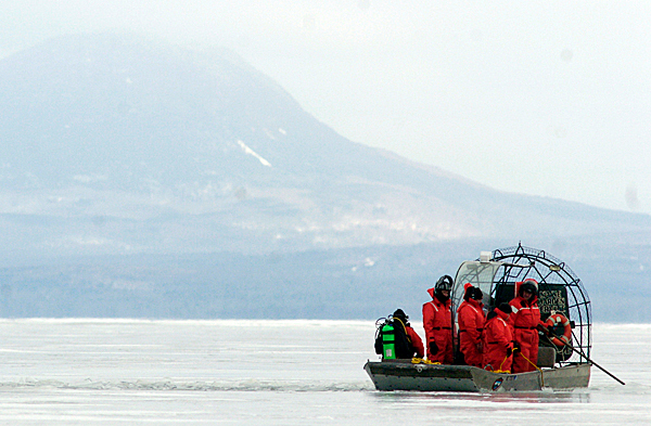 From their search and rescue boat, Maine Warden Service personnel keep an eye on one of their divers Friday morning near the East Outlet of Moosehead Lake. On Thursday three persons on shore said they spotted a person struggling in the water near the East Outlet behind Wilsons campground which promted game wardens and other emergency responders to the area. Two dives were conducted Friday morning and no evidence of a person or their belongings was found, according to game wardens. BANGOR DAILY NEWS PHOTO BY JOHN CLARKE RUSS From their search and rescue boat, Maine Warden Service personnel keep an eye on one of their divers Friday morning near the East Outlet of Moosehead Lake. On Thursday three persons on shore said they spotted a person struggling in the water near the East Outlet behind Wilsons campground which promted game wardens and other emergency responders to the area. Two dives were conducted Friday morning and no evidence of a person or their belongings was found, according to game wardens. BANGOR DAILY NEWS PHOTO BY JOHN CLARKE RUSS