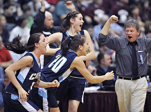 Calais Girl's basketball coach Dana Redding celebrates as his team rushes the floor in triumph over Washington Academy in the Class C Eastern Maine final game at the Bangor Auditorium, Saturday, Feb. 20, 2010. BANGOR DAILY NEWS PHOTO BY MICHAEL C. YORK Calais Girl's basketball coach Dana Redding celebrates as his team rushes the floor in triumph over Washington Academy in the Class C Eastern Maine final game at the Bangor Auditorium, Saturday, Feb. 20, 2010. BANGOR DAILY NEWS PHOTO BY MICHAEL C. YORK