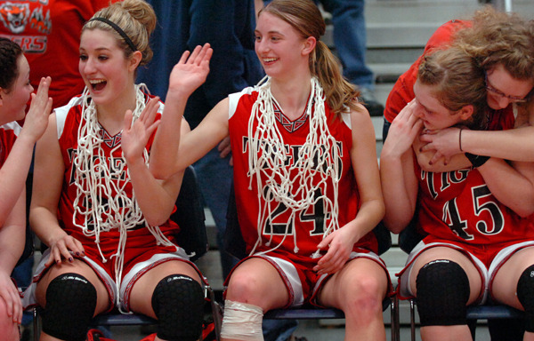 The Fort Fairfield Tigers including (from left) Danielle Tracy, Kelsie Wilson, Courtney Churchill and Amanda Hotham celebrate their 67-59 win over Greenville for the Girls Class D basketball championship Saturday, Feb. 27, 2010 at the Augusta Civic Center. Buy Photo The Fort Fairfield Tigers including (from left) Danielle Tracy, Kelsie Wilson, Courtney Churchill and Amanda Hotham celebrate their 67-59 win over Greenville for the Girls Class D basketball championship Saturday, Feb. 27, 2010 at the Augusta Civic Center. Buy Photo