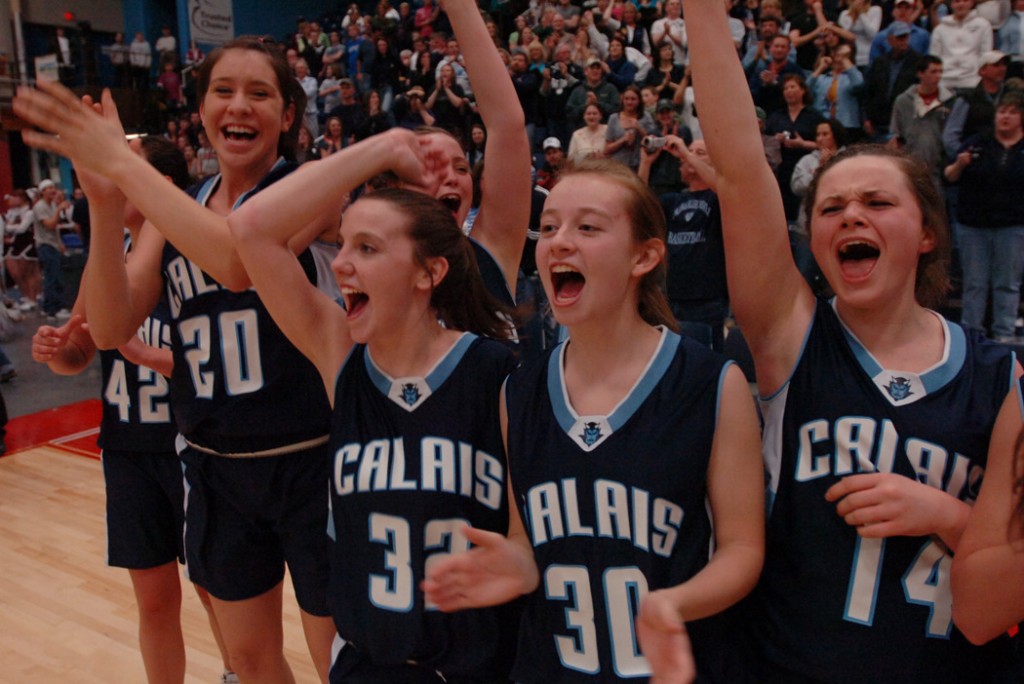 Calais Blue Devil basketball players from left, Brook Young,
Kathleen Clement, Rebecca Redding, Meaghan Cavanaugh and Sarah Smith cheer on their teammates as they remove the nets at the Augusta Civic Center on Saturday, Feb. 27, 2010 after defeating Madison for the class B girls state championship.
(Bangor Daily News/Kevin Bennett) Calais Blue Devil basketball players from left, Brook Young,
Kathleen Clement, Rebecca Redding, Meaghan Cavanaugh and Sarah Smith cheer on their teammates as they remove the nets at the Augusta Civic Center on Saturday, Feb. 27, 2010 after defeating Madison for the class B girls state championship.
(Bangor Daily News/Kevin Bennett)