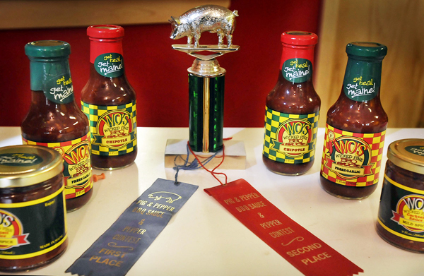 Wo's sauces have won awards in blind taste tests in New England competitions. Bangor Daily News/Michael C. York Wo's sauces have won awards in blind taste tests in New England competitions. Bangor Daily News/Michael C. York