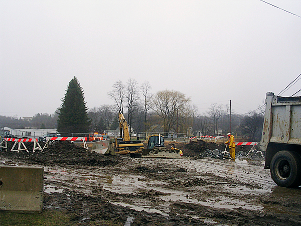 Crews worked through the mist Wednesday morning filling in the sinkhole on Old County Road in Rockland. BANGOR DAILY NEWS PHOTO BY HEATHER STEEVES Crews worked through the mist Wednesday morning filling in the sinkhole on Old County Road in Rockland. BANGOR DAILY NEWS PHOTO BY HEATHER STEEVES