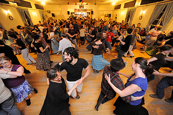 Particpants move to the eclectic beats of the Whitefield-based Henry Road Bandits during Belfast Flying Shoes contradance at American Legion Post 43 Friday night, April 2, 2010. BANGOR DAILY NEWS PHOTO BY JOHN CLARKE RUSS Particpants move to the eclectic beats of the Whitefield-based Henry Road Bandits during Belfast Flying Shoes contradance at American Legion Post 43 Friday night, April 2, 2010. BANGOR DAILY NEWS PHOTO BY JOHN CLARKE RUSS