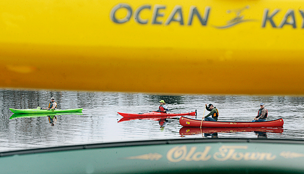 People paddle on the Penobscot River to provide background for a press conference announcing Old Town's Stay & Play Adventure packages. The city hopes to promote the guided tours that showcase Old Town area waterways. BANGOR DAILY NEWS PHOTO BY GABOR DEGRE People paddle on the Penobscot River to provide background for a press conference announcing Old Town's Stay & Play Adventure packages. The city hopes to promote the guided tours that showcase Old Town area waterways. BANGOR DAILY NEWS PHOTO BY GABOR DEGRE
