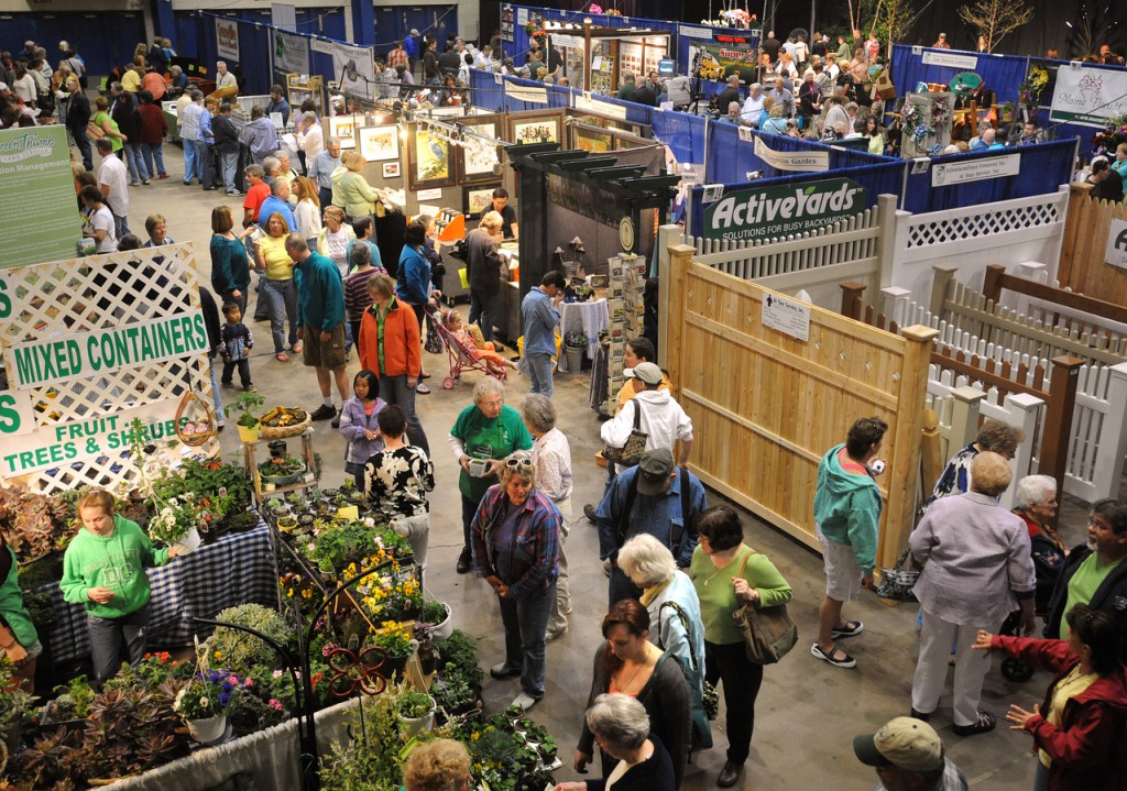 People look at the exhibitors displays at the Bangor Garden Show Saturday morning. The show returned after a one-year hiatus and is continuing the tradition that started in 1991. Over 50 landscape and gardening vendors and displays as well as several demonstrations offer a diverse display this spring. (Bangor Daily News/Gabor Degre) People look at the exhibitors displays at the Bangor Garden Show Saturday morning. The show returned after a one-year hiatus and is continuing the tradition that started in 1991. Over 50 landscape and gardening vendors and displays as well as several demonstrations offer a diverse display this spring. (Bangor Daily News/Gabor Degre)