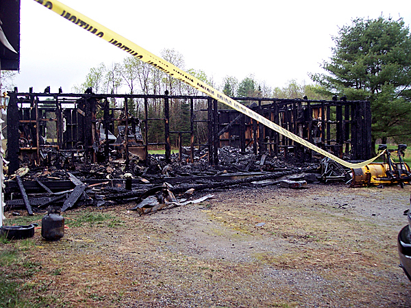 Investigators are still trying to determine the case of the fire that destroyed this home at 293 Winnecook Road in Burnham early Wednesday morning. BANGOR DAILY NEWS PHOTO BY CHRISTOPHER COUSINS Investigators are still trying to determine the case of the fire that destroyed this home at 293 Winnecook Road in Burnham early Wednesday morning. BANGOR DAILY NEWS PHOTO BY CHRISTOPHER COUSINS