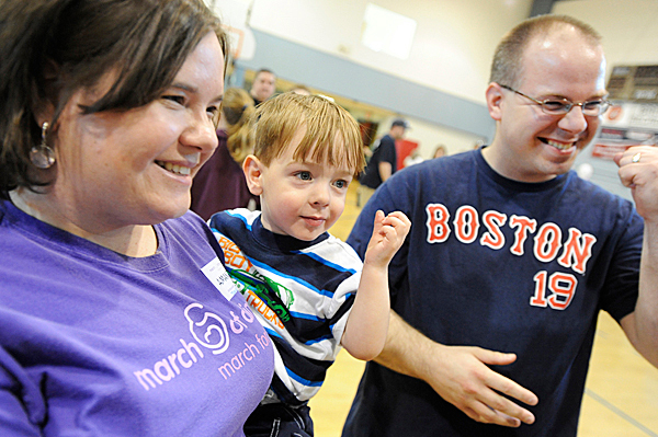 This year's March for Babies family ambassadors Amanda and Alex Pate of Old Town laughed as dad mimics their two-year-old son Austin by flexing his muscles before Sunday morning's Brewer/Bangor March of Dimes annual March for Babies. In December 2007, Austin was born before Amanda Pate came to full term in her pregnancy. This fundraiser honors babies born healthy and ones like Austin Pate that needed extra help to survive and become healthy. BANGOR DAILY NEWS PHOTO BY JOHN CLARKE RUSS This year's March for Babies family ambassadors Amanda and Alex Pate of Old Town laughed as dad mimics their two-year-old son Austin by flexing his muscles before Sunday morning's Brewer/Bangor March of Dimes annual March for Babies. In December 2007, Austin was born before Amanda Pate came to full term in her pregnancy. This fundraiser honors babies born healthy and ones like Austin Pate that needed extra help to survive and become healthy. BANGOR DAILY NEWS PHOTO BY JOHN CLARKE RUSS