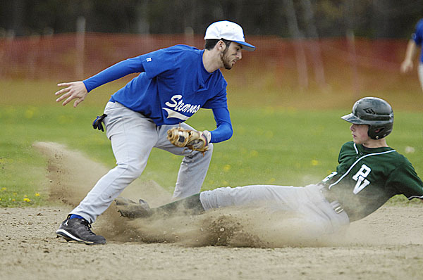 Stearn's Garen Manzo, (2), tags out Howler's Robbie Hallett, (22), at second base in the 4th inning of their game in Howland, Wednesday, May 5, 2010. BANGOR DAILY NEWS PHOTO BY MICHAEL C. YORK Stearn's Garen Manzo, (2), tags out Howler's Robbie Hallett, (22), at second base in the 4th inning of their game in Howland, Wednesday, May 5, 2010. BANGOR DAILY NEWS PHOTO BY MICHAEL C. YORK