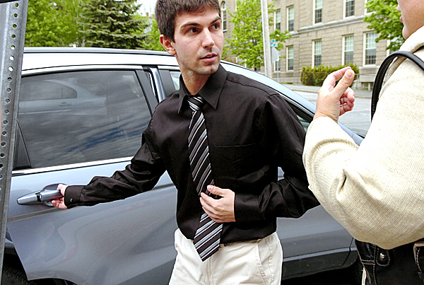 Getting into a car driven by his girlfriend, Jillian Krause, Derek Stansberry of Riverview, Fla. talks to Federal Public Defender Virginia Villa (right) after leaving U.S. District Court in Bangor on Friday, May 14, 2010 after he was released on $20,000 bail. Stansberry faces charges after he passed along a note that said he had a fake passport and told federal air marshals that he had dynamite aboard a Paris-to-Atlanta flight on April 27, according to prosecutors. BANGOR DAILY NEWS PHOTO BY BRIDGET BROWN Getting into a car driven by his girlfriend, Jillian Krause, Derek Stansberry of Riverview, Fla. talks to Federal Public Defender Virginia Villa (right) after leaving U.S. District Court in Bangor on Friday, May 14, 2010 after he was released on $20,000 bail. Stansberry faces charges after he passed along a note that said he had a fake passport and told federal air marshals that he had dynamite aboard a Paris-to-Atlanta flight on April 27, according to prosecutors. BANGOR DAILY NEWS PHOTO BY BRIDGET BROWN