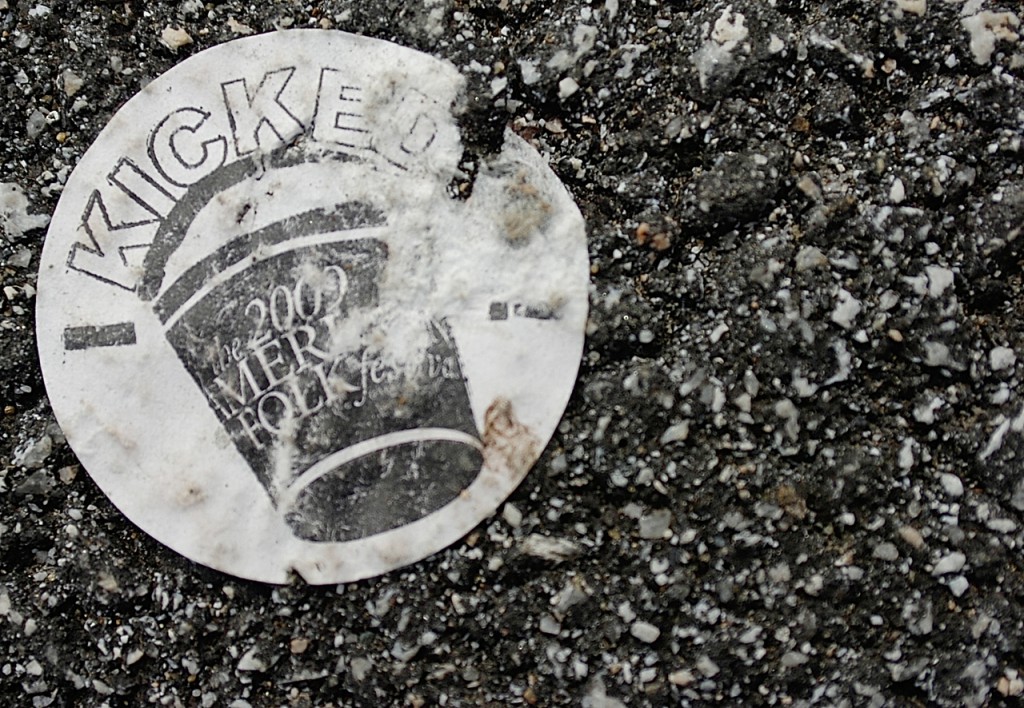 A tattered 2009 American Folk Festival Bucket Brigade donor sticker remains affixed to the asphalt on Bangor's waterfront nearly a month after the festival. Photographed September 22, 2009. (Bangor Daily News/John Clarke Russ) A tattered 2009 American Folk Festival Bucket Brigade donor sticker remains affixed to the asphalt on Bangor's waterfront nearly a month after the festival. Photographed September 22, 2009. (Bangor Daily News/John Clarke Russ)