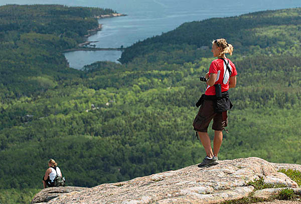 Rachel DeYoung, right, and Amy Veenstra, left, both college students from Michigan take in the view from the top of Cadillac on Friday, May 28, 2010. The pair was joined by Becky Lockwood and Tara Kloostra, the four are on a college graduation road trip to experience New York, Boston, New Hampsire and Maine. BANGOR DAILY NEWS PHOTO BY KEVIN BENNETT Rachel DeYoung, right, and Amy Veenstra, left, both college students from Michigan take in the view from the top of Cadillac on Friday, May 28, 2010. The pair was joined by Becky Lockwood and Tara Kloostra, the four are on a college graduation road trip to experience New York, Boston, New Hampsire and Maine. BANGOR DAILY NEWS PHOTO BY KEVIN BENNETT