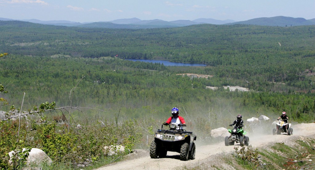 In this May 23, 2010 photo, Jude Stohl leads Leigha Cicchetto, and his son Ethan Stohl on a ride through Jericho Park's trail system, in Berlin, N.H. The park has one of the largest and longest trail systems in the Northeast designed for off-road vehicles. (AP Photo/Jim Cole) In this May 23, 2010 photo, Jude Stohl leads Leigha Cicchetto, and his son Ethan Stohl on a ride through Jericho Park's trail system, in Berlin, N.H. The park has one of the largest and longest trail systems in the Northeast designed for off-road vehicles. (AP Photo/Jim Cole)
