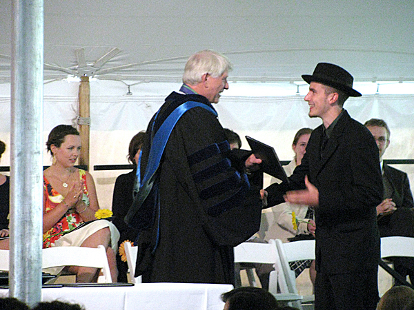 BAR HARBOR - College of the Atlantic President David Hales hands a diploma Saturday to graduating student Thomas Andrew Ceranic of Pittsburgh, Penn. Seventy students received degrees in human ecology. BANGOR DAILY NEWS PHOTO BY ABIGAIL CURTIS BAR HARBOR - College of the Atlantic President David Hales hands a diploma Saturday to graduating student Thomas Andrew Ceranic of Pittsburgh, Penn. Seventy students received degrees in human ecology. BANGOR DAILY NEWS PHOTO BY ABIGAIL CURTIS