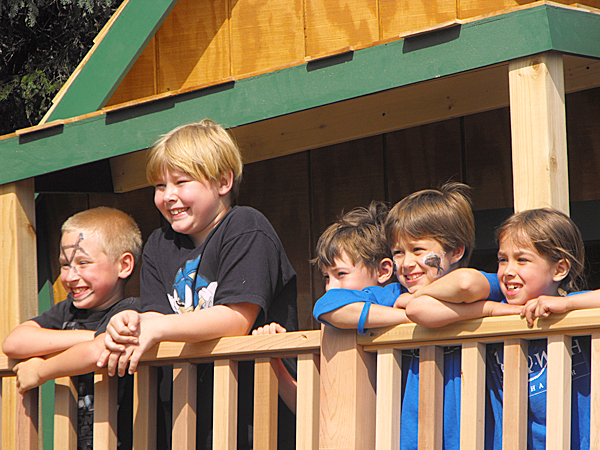 Leif Dahlk of Littleton (second from right, in blue shirt,) poses with some friends on the porch of his new playhouse in the back yard of his home on the Hill Siding Road. Dahlk, an 8-year-old cancer survivor, saw his wish for a club house come true on Saturday thanks to the Make-A-Wish Foundation of Maine, the Betty Crocker Stirring Up Wishes program and a number of volunteers. BANGOR DAILY NEWS PHOTO BY JEN LYNDS Leif Dahlk of Littleton (second from right, in blue shirt,) poses with some friends on the porch of his new playhouse in the back yard of his home on the Hill Siding Road. Dahlk, an 8-year-old cancer survivor, saw his wish for a club house come true on Saturday thanks to the Make-A-Wish Foundation of Maine, the Betty Crocker Stirring Up Wishes program and a number of volunteers. BANGOR DAILY NEWS PHOTO BY JEN LYNDS