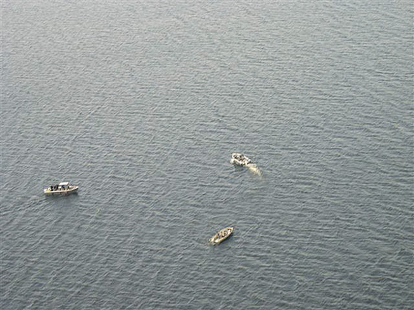 An aerial shot from a Maine Warden Service plane shows the area being searched for a missing boater, Scott James, 40, of Princeton, by three Maine Warden Service boats. (Photo Courtesy of Maine Department of Inland Fisheries and Wildlife) An aerial shot from a Maine Warden Service plane shows the area being searched for a missing boater, Scott James, 40, of Princeton, by three Maine Warden Service boats. (Photo Courtesy of Maine Department of Inland Fisheries and Wildlife)