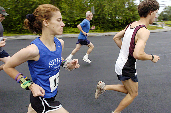 Eventual female division winner Kristine Guaraldo (left, foreground) of South Portland at the start of the 35th Annual Tour du Lac 10-mile road race in Buckport Saturday morning, June 26, 2010. Guaraldo's time was 1:05:25 and she finished 15th place overall. BANGOR DAILY NEWS PHOTO BY JOHN CLARKE RUSS Eventual female division winner Kristine Guaraldo (left, foreground) of South Portland at the start of the 35th Annual Tour du Lac 10-mile road race in Buckport Saturday morning, June 26, 2010. Guaraldo's time was 1:05:25 and she finished 15th place overall. BANGOR DAILY NEWS PHOTO BY JOHN CLARKE RUSS
