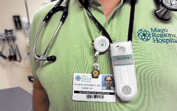 A Vocera communicator hangs from the neck of emergency room doctor David McDermott at Mayo Regional Hospital on Wedneday, June 23, 2010. A Vocera communications system allows hospital workers to instantly communicate with each other, hands free, using simple voice commands. (Bangor Daily News/Kevin Bennett) A Vocera communicator hangs from the neck of emergency room doctor David McDermott at Mayo Regional Hospital on Wedneday, June 23, 2010. A Vocera communications system allows hospital workers to instantly communicate with each other, hands free, using simple voice commands. (Bangor Daily News/Kevin Bennett)