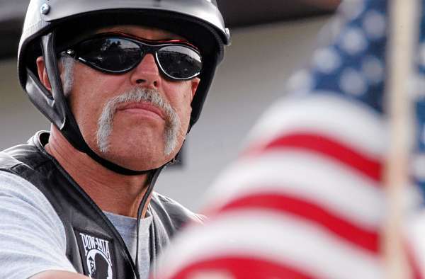 LEGION1: Francis Pelkey, 58, of Millinocket stops outside the American Legion Post 80 on Central Street in Millinocket on Saturday after completing a run to raise funds to send care packages to service personnel overseas. (Bangor Daily News/Nick Sambides Jr.) LEGION1: Francis Pelkey, 58, of Millinocket stops outside the American Legion Post 80 on Central Street in Millinocket on Saturday after completing a run to raise funds to send care packages to service personnel overseas. (Bangor Daily News/Nick Sambides Jr.)
