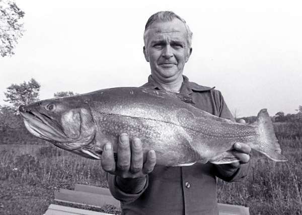James "Bob" Foster Sr. of Howland poses with the 8-pound, 8-ounce brook trout that he caught in Aroostook County's Chase Pond back in 1979. The trout held the state record for more than 30 years before that record was recently broken. The other anglers in Foster's party that day also had good luck, landing three fish that ranged from 4 1/2 to more than eight pounds. Photo taken Oct. 2, 1979. (Bangor Daily News file shot/Scott Haskell) WITH HOLYOKE STORY James "Bob" Foster Sr. of Howland poses with the 8-pound, 8-ounce brook trout that he caught in Aroostook County's Chase Pond back in 1979. The trout held the state record for more than 30 years before that record was recently broken. The other anglers in Foster's party that day also had good luck, landing three fish that ranged from 4 1/2 to more than eight pounds. Photo taken Oct. 2, 1979. (Bangor Daily News file shot/Scott Haskell) WITH HOLYOKE STORY