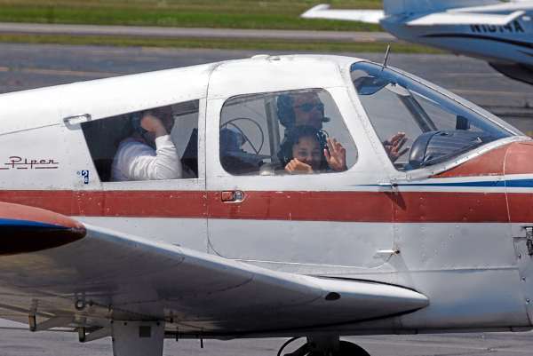 At the conclusion of an Angel Flight , pilot Dan Herrick taxis his single-engine plane into a spot on the General Aviation ramp at Bangor International Airport with Camara Johnson, 11, of Woodland, and her mother, Cherie Nichols, who were brought to Bangor for a medical appointment for the girl.(Bangor Daily News/Scott Haskell) At the conclusion of an Angel Flight , pilot Dan Herrick taxis his single-engine plane into a spot on the General Aviation ramp at Bangor International Airport with Camara Johnson, 11, of Woodland, and her mother, Cherie Nichols, who were brought to Bangor for a medical appointment for the girl.(Bangor Daily News/Scott Haskell)