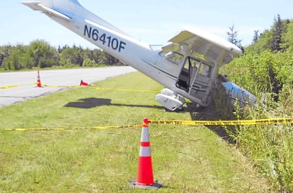 Hewitt story: SLUG: AIRCRASH Two people escaped injury Tuesday, July 27, 2010 when their single-engine plane crashed while landing at the Stonington Airport. PHOTO COURTESY OF KATHLEEN BILLINGS-PEZARIS Hewitt story: SLUG: AIRCRASH Two people escaped injury Tuesday, July 27, 2010 when their single-engine plane crashed while landing at the Stonington Airport. PHOTO COURTESY OF KATHLEEN BILLINGS-PEZARIS