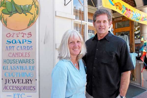Grasshopper Shop owners Laurie and Rick Schweikert pose outside their storefront Friday, July 23, 2010 in downtown Bangor. The Schweikerts are making a sales agreement with Mexicali Blues store owners Pete and Kim Erskin. Plans to convert the shop are in the works for the spring. (Bangor Daily News/Bridget Brown) Grasshopper Shop owners Laurie and Rick Schweikert pose outside their storefront Friday, July 23, 2010 in downtown Bangor. The Schweikerts are making a sales agreement with Mexicali Blues store owners Pete and Kim Erskin. Plans to convert the shop are in the works for the spring. (Bangor Daily News/Bridget Brown)