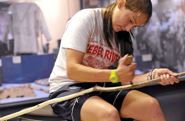 Sikwani Dana, 17, daughter of Barry and Lori Dana of Solon, debarks ash saplings to be used for the internal structure of a wigwam they are helping to build at the Hudson Museum at the University of Maine in Orono. Photographed Monday afternoon, August 2, 2010. (Bangor Daily News/John Clarke Russ) Sikwani Dana, 17, daughter of Barry and Lori Dana of Solon, debarks ash saplings to be used for the internal structure of a wigwam they are helping to build at the Hudson Museum at the University of Maine in Orono. Photographed Monday afternoon, August 2, 2010. (Bangor Daily News/John Clarke Russ)