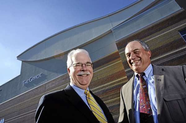 John Rohman, left, WBRC chairman and Stephen Rich, left, WBRC President/CEO in front of the the Gracie Theater at Husson University Campus August 17, 2010. The Gracie Theater is one of the many large projects the Bangor-based architectural and engineering firm has undertaken in its hundred-plus year history. (Bangor Daily News/John Clarke Russ) John Rohman, left, WBRC chairman and Stephen Rich, left, WBRC President/CEO in front of the the Gracie Theater at Husson University Campus August 17, 2010. The Gracie Theater is one of the many large projects the Bangor-based architectural and engineering firm has undertaken in its hundred-plus year history. (Bangor Daily News/John Clarke Russ)