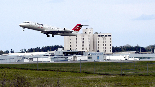 A passenger jet leaves the runway at Bangor International Airport on Wednesday. Recently there have been an increasing number of flights diverted to BIA with passengers on the no-fly list. (AP Photo/Bob DeLong) A passenger jet leaves the runway at Bangor International Airport on Wednesday. Recently there have been an increasing number of flights diverted to BIA with passengers on the no-fly list. (AP Photo/Bob DeLong)
