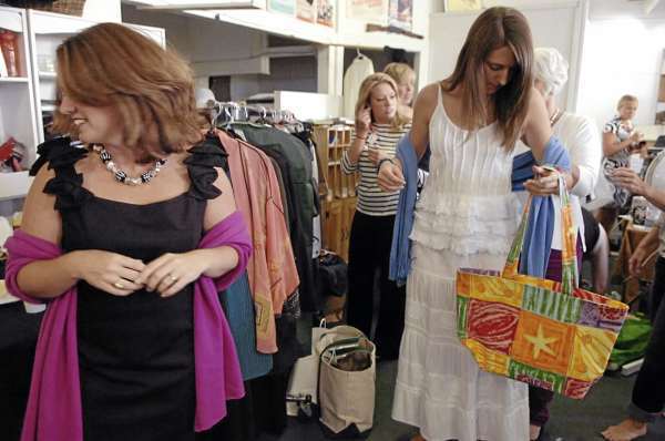 Melissa Nowell (left) of Hancock and Sara Allen of Ellsworth prepare backstage for the 8th annual "In Grand Style" Fashion Show & Luncheon at the Grand theatre in Ellsworth on Friday, Aug. 20, 2010. The event featured local models wearing locally sold clothing from area businesses and a silent auction to benefit The Grand. Nowell's dress and accessories were provided by The Kimball Shop and Allen's by SaraSara's. (Bangor Daily News/Bridget Brown) Melissa Nowell (left) of Hancock and Sara Allen of Ellsworth prepare backstage for the 8th annual "In Grand Style" Fashion Show & Luncheon at the Grand theatre in Ellsworth on Friday, Aug. 20, 2010. The event featured local models wearing locally sold clothing from area businesses and a silent auction to benefit The Grand. Nowell's dress and accessories were provided by The Kimball Shop and Allen's by SaraSara's. (Bangor Daily News/Bridget Brown)