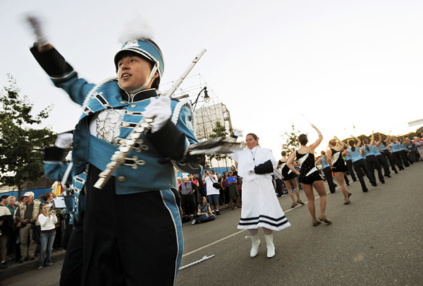 Rosie Tanabe flute player with the Pride of Maine Black Bear Marching Band dances in the street as they play the Beer Barrell Polka during the opening of the American Folk Festival on Friday, August 27, 2010. BANGOR DAILY NEWS PHOTO BY KEVIN BENNETT Rosie Tanabe flute player with the Pride of Maine Black Bear Marching Band dances in the street as they play the Beer Barrell Polka during the opening of the American Folk Festival on Friday, August 27, 2010. BANGOR DAILY NEWS PHOTO BY KEVIN BENNETT
